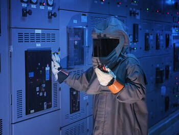 Technician wearing a full safety suit
